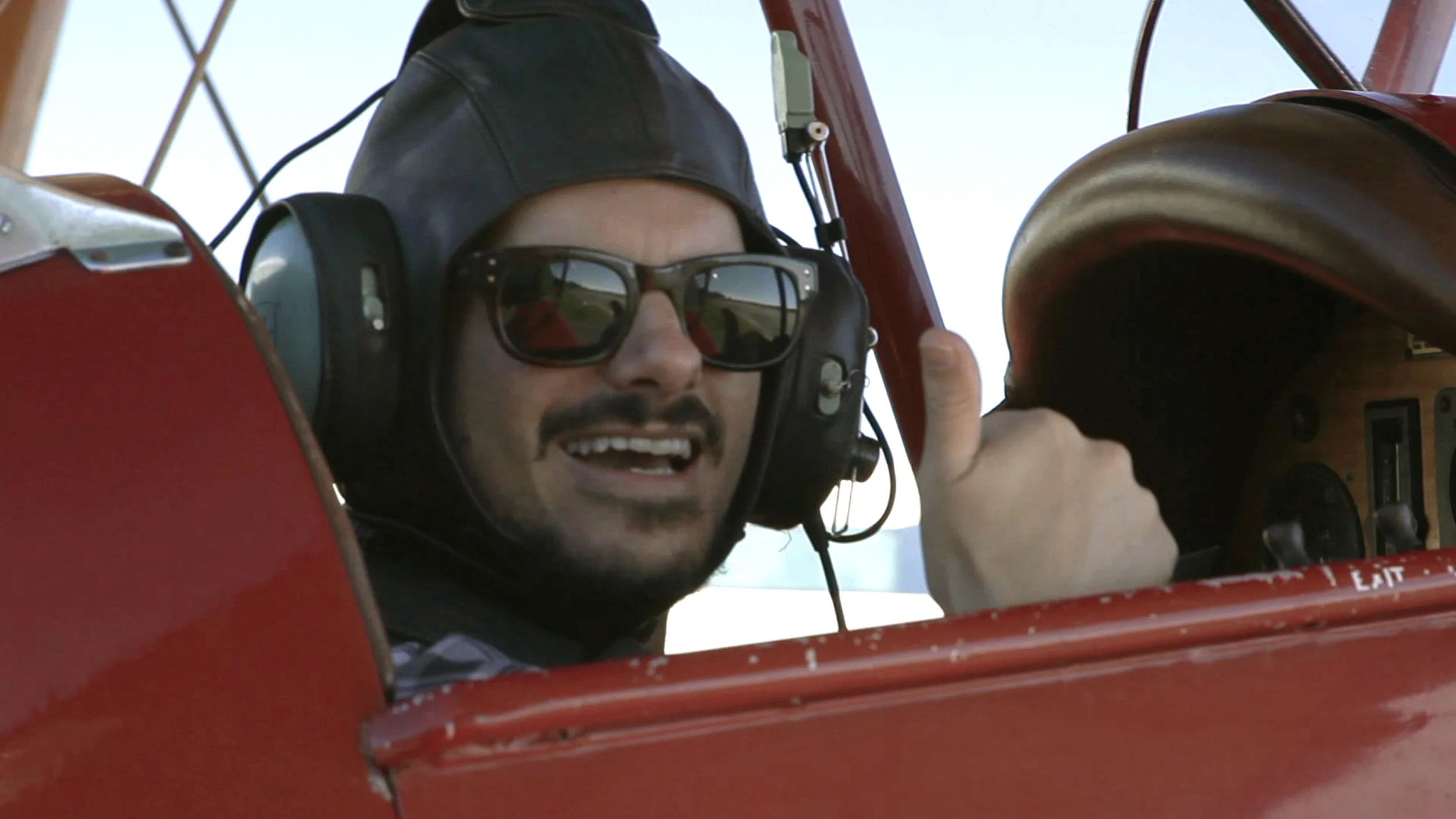 Andrew Lancaster in a Tiger Moth, Queensland