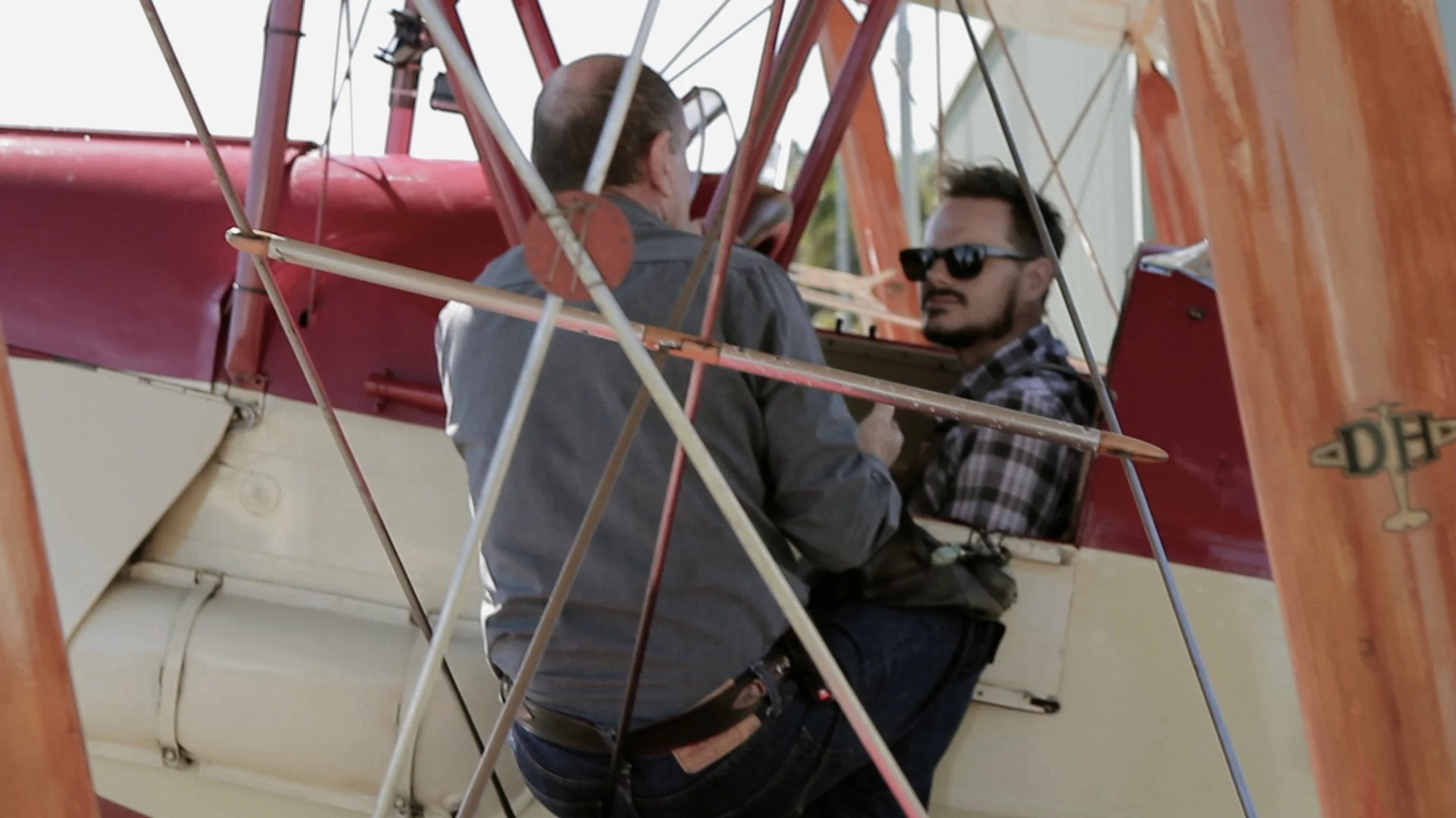 Andrew Lancaster in a Tiger Moth